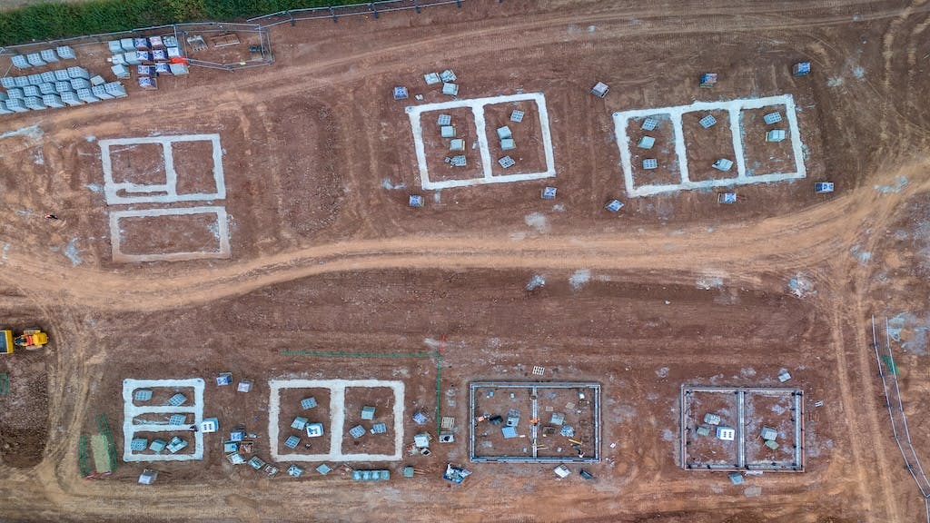 Aerial view of home lots, showing a subdivision in the process of being built