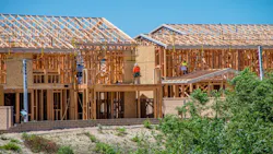 Builders work on new rental housing development Builders work on new rental housing development