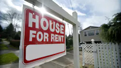 A single-family home with a sign in the front yard that says 'House For Rent' A single-family home with a sign in the front yard that says 'House For Rent'