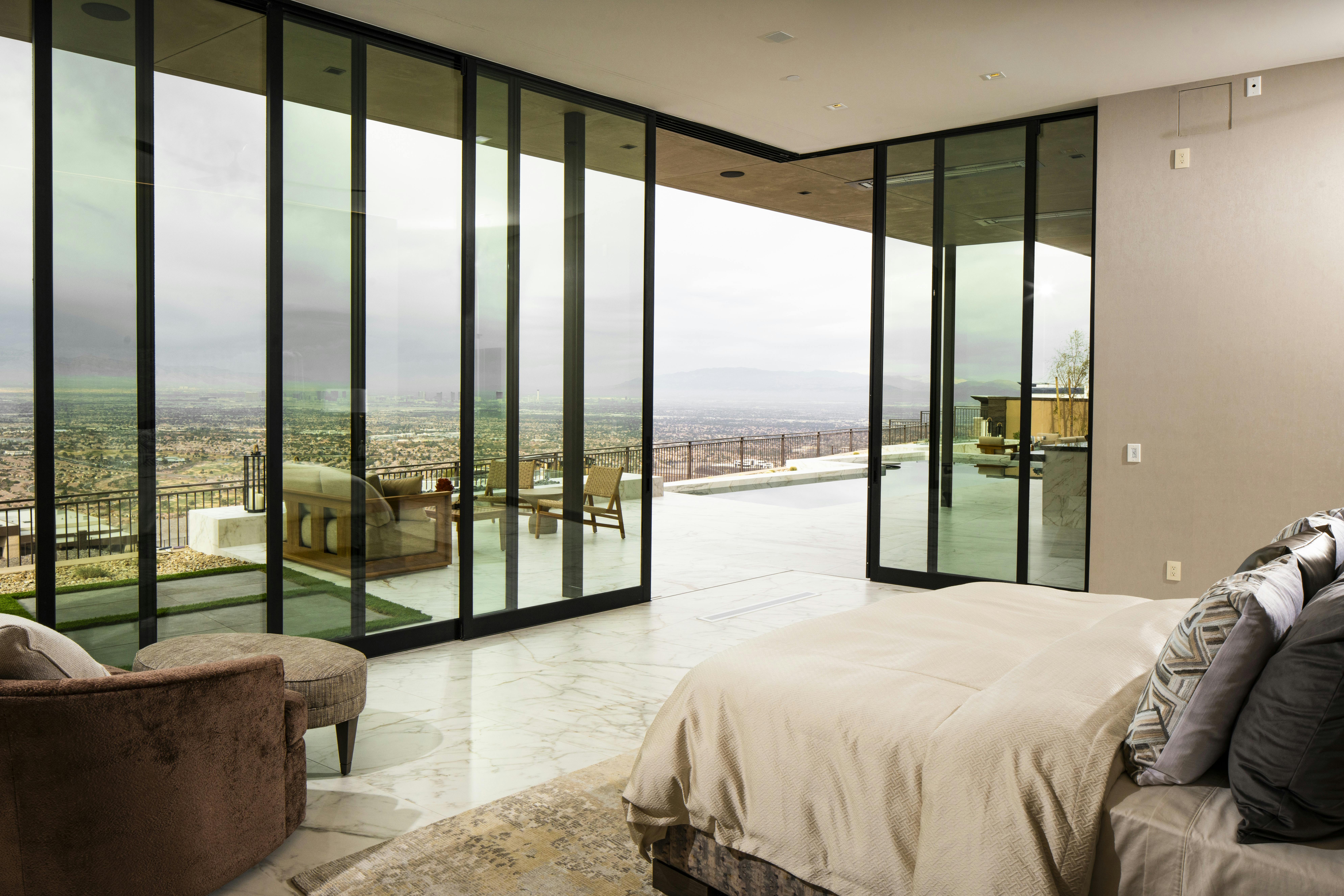 The Series 600 Multi-Slide Door from Western Window Systems enables a seamless transition from indoor to outdoor living areas across the back of the home.