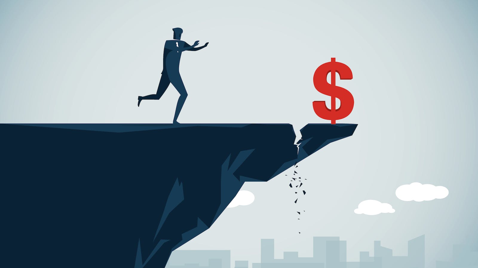 Man runs toward red dollar sign teetering on edge of tax cliff