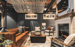 Clubhouse lounge with textile themed rope ceiling at Chronicle Mill, a 2023 BALA winner Clubhouse lounge with textile themed rope ceiling at Chronicle Mill, a 2023 BALA winner