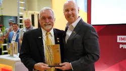 NAHB's Buddy Hughes (left) and Jim Tobin (right) pose together with Builders Mutual Safety Award for Excellence (SAFE) NAHB's Buddy Hughes (left) and Jim Tobin (right) pose together with Builders Mutual Safety Award for Excellence (SAFE)