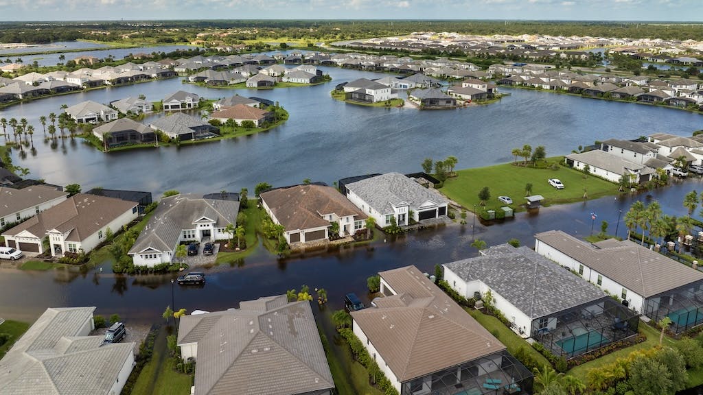Homes flooded in the aftermath of a hurricane are a stark reminder of the impact of extreme weather events.