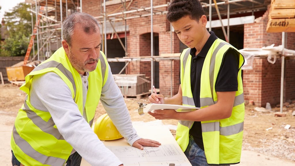 Young construction worker in training