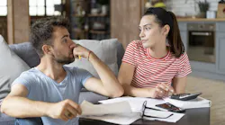 Couple doing their budget decide to postpone their home purchase. Couple doing their budget decide to postpone their home purchase.