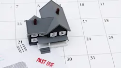 A calendar showing a homeowner is past due on their mortgage A calendar showing a homeowner is past due on their mortgage