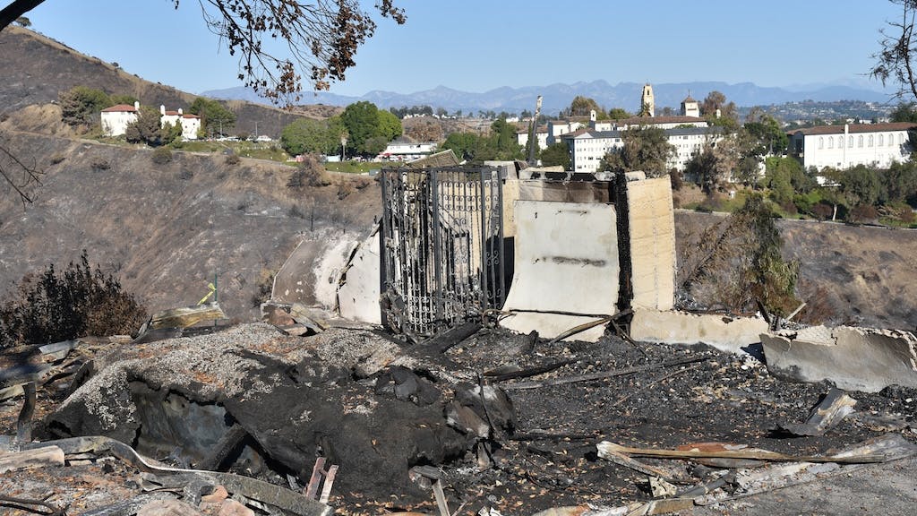 Home damaged by wildfire in California