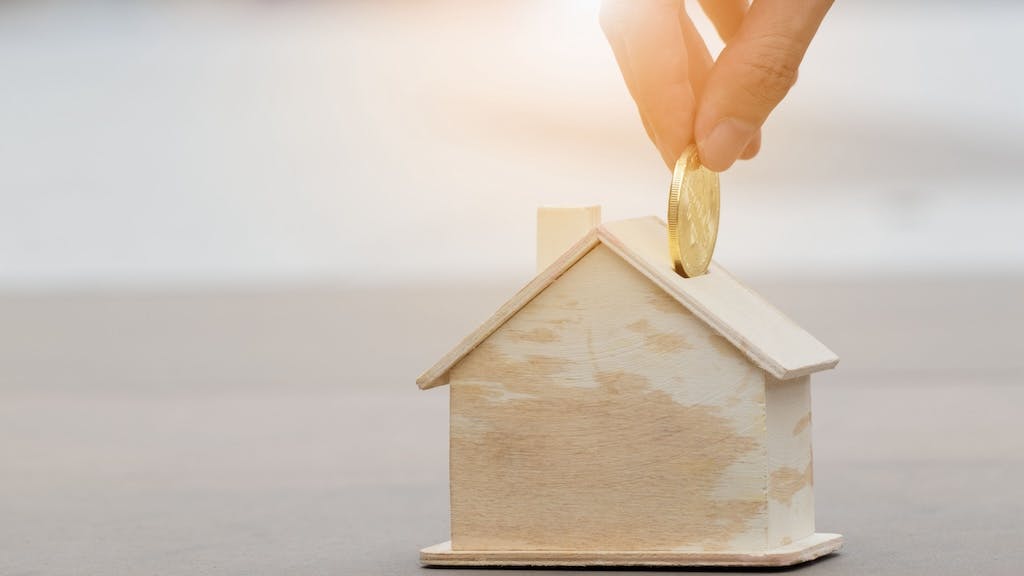 Concept putting money into a house