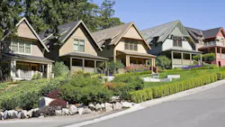 Row of homes on a hilly street Row of homes on a hilly street
