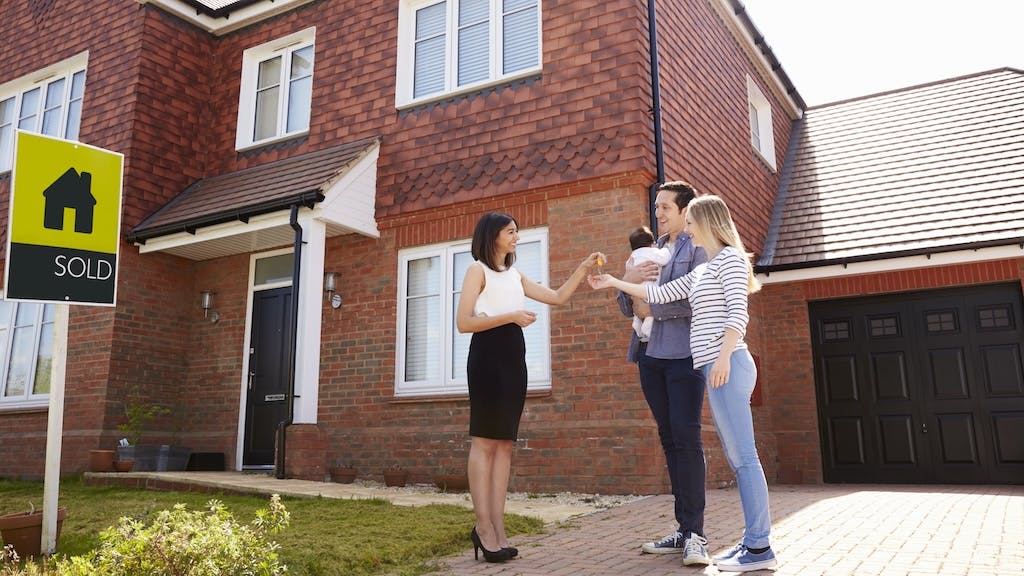Young couple buys a home for the first time