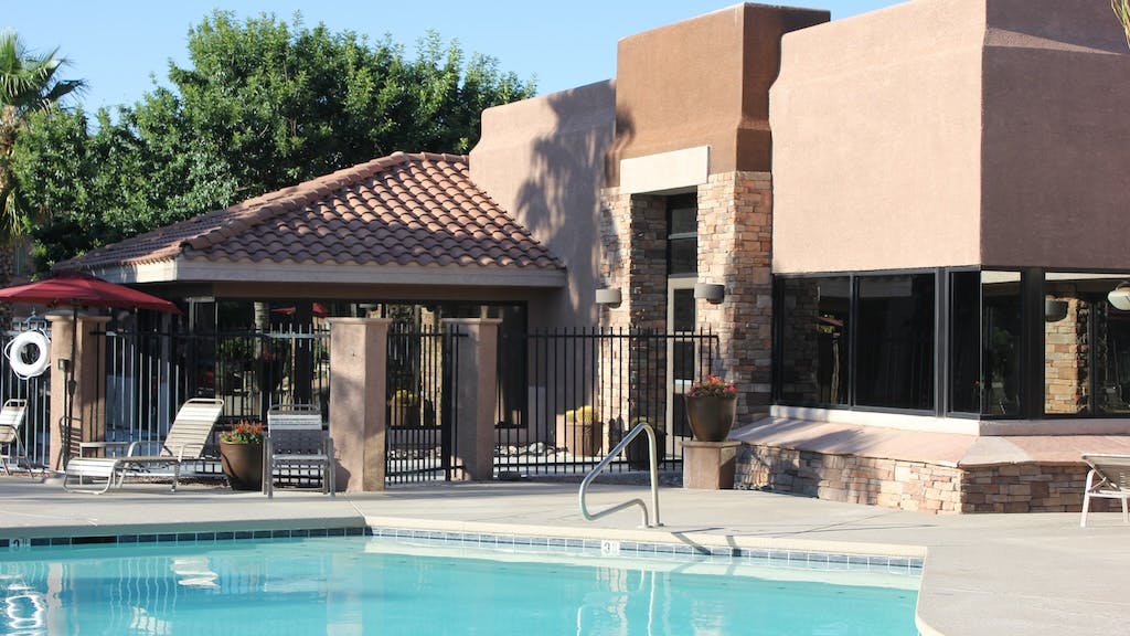 Pool and clubhouse at apartment complex
