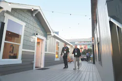 Attendees make their way toward one of the Show Village show homes Attendees make their way toward one of the Show Village show homes