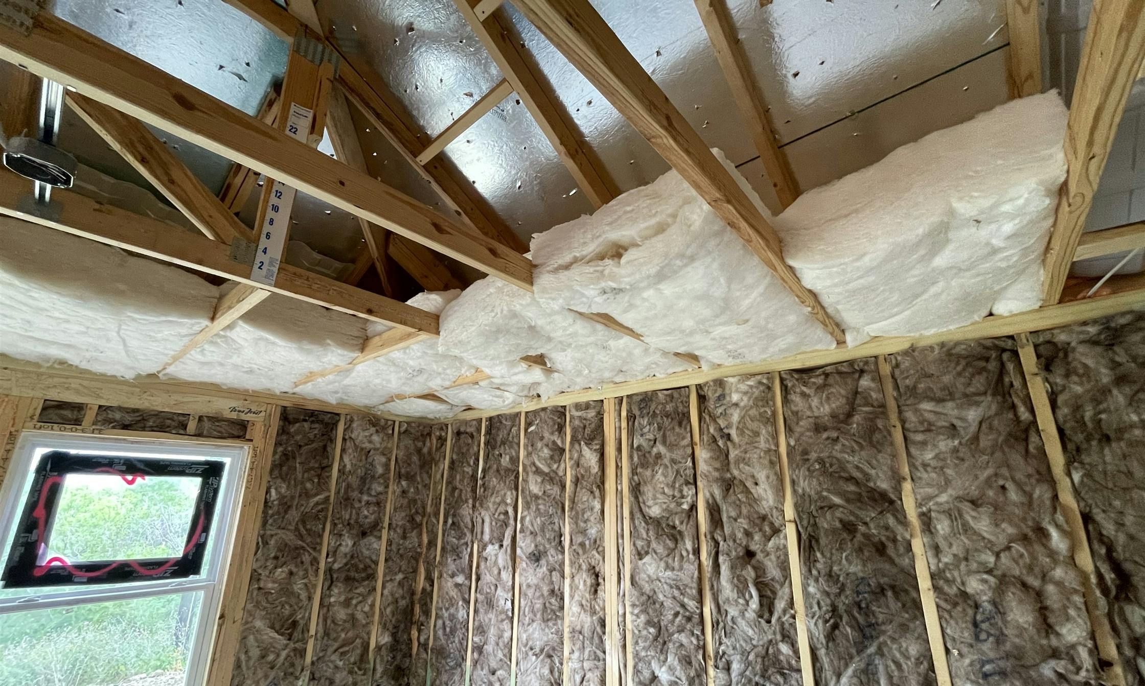 An Energy Star staple for whole-home certification calls for specifying and installing Grade I insulation (per the Residential Energy Services Network, or RESNET, standards) in all assemblies, as well as prebatting in hard-to-reach areas of the attic.