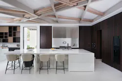 Sitting just off the great room, the kitchen is as practical as it is luxurious, connecting into both a bar and back kitchen area that serve as extra space for catered events. Sitting just off the great room, the kitchen is as practical as it is luxurious, connecting into both a bar and back kitchen area that serve as extra space for catered events.