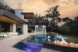 The home features ample outdoor space, with multiple terraces, an infinity-edge pool, an outdoor kitchen, dining area, and more. The home features ample outdoor space, with multiple terraces, an infinity-edge pool, an outdoor kitchen, dining area, and more.