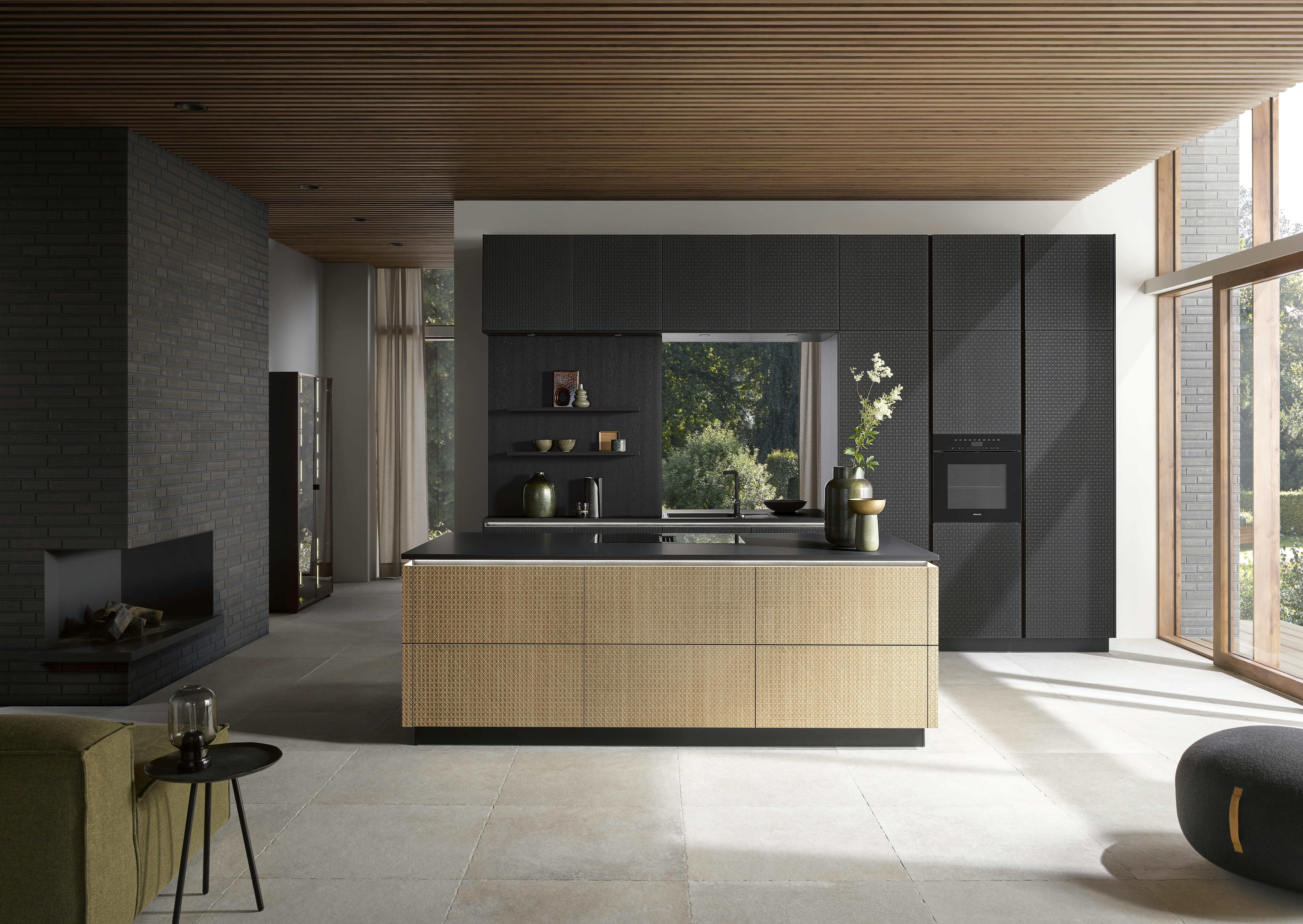 Kitchen showing rattan cabinet fronts by H&auml;cker Kitchens