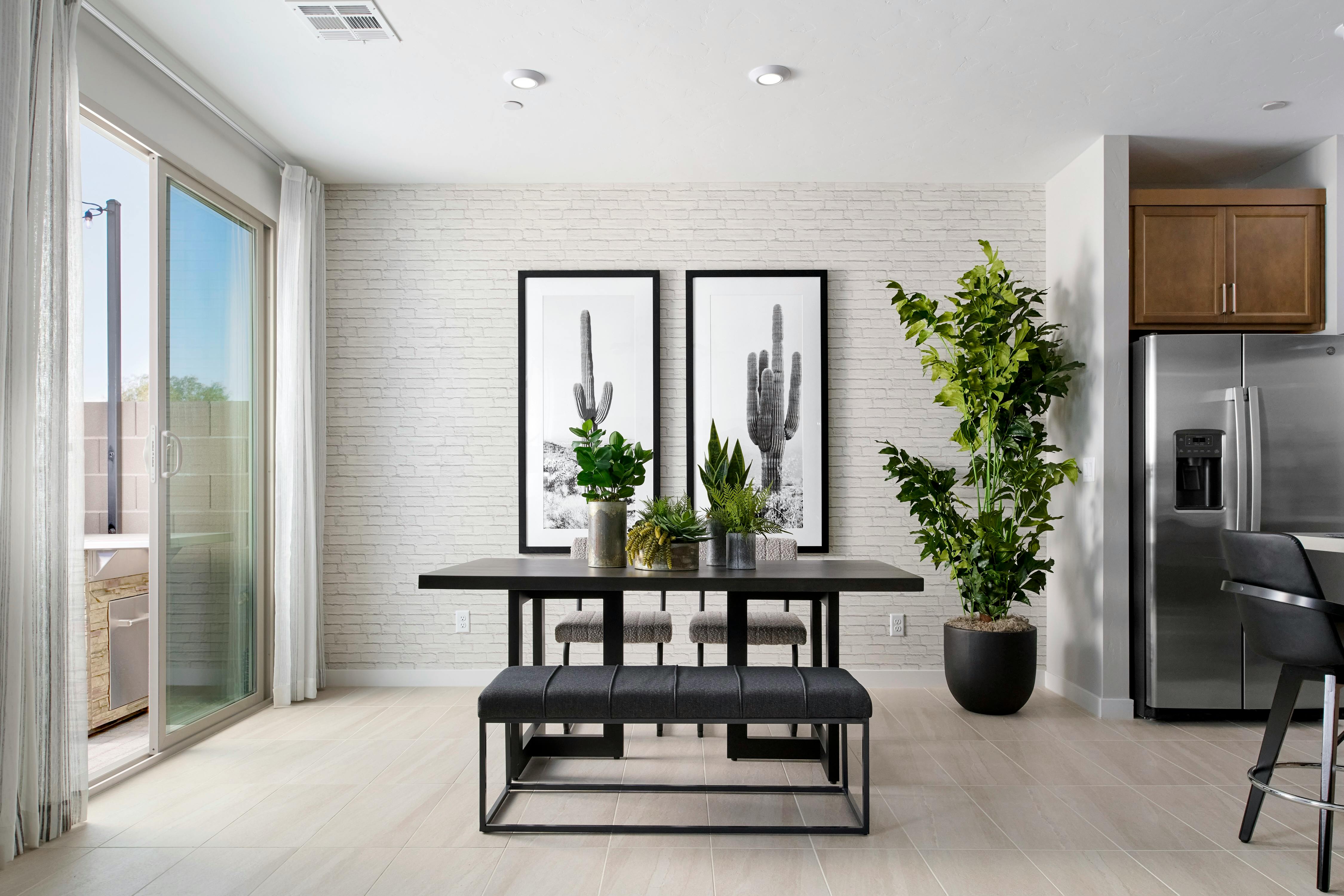 For the dining room at Southridge Pointe by Tri Pointe Homes and WHA in Las Vegas, Pacific Dimensions added subtle texture to one wall, a relatively low-cost yet memorable accent.