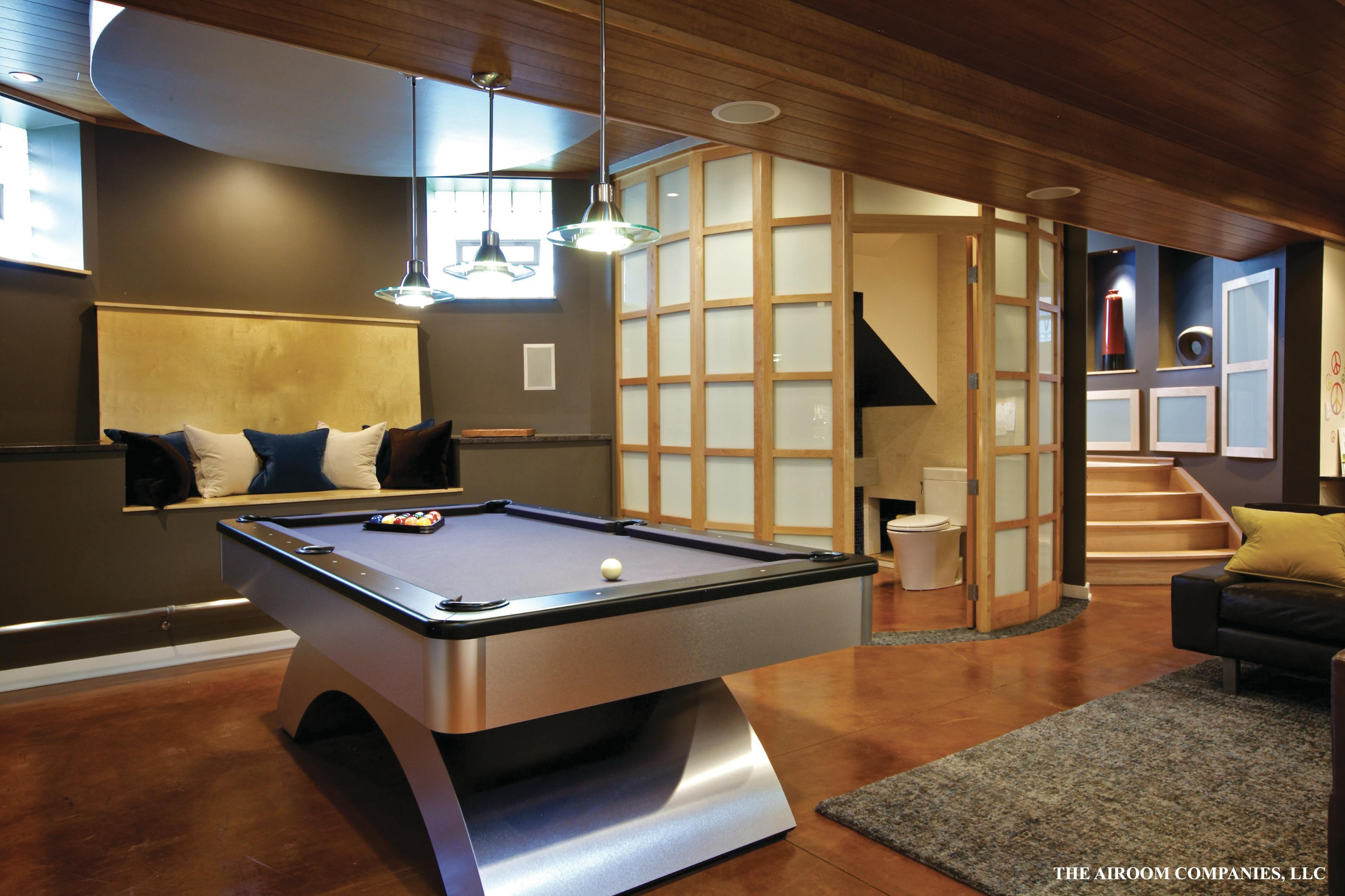 Underpinning the basement level allowed the room to gain space. The ceilings wer