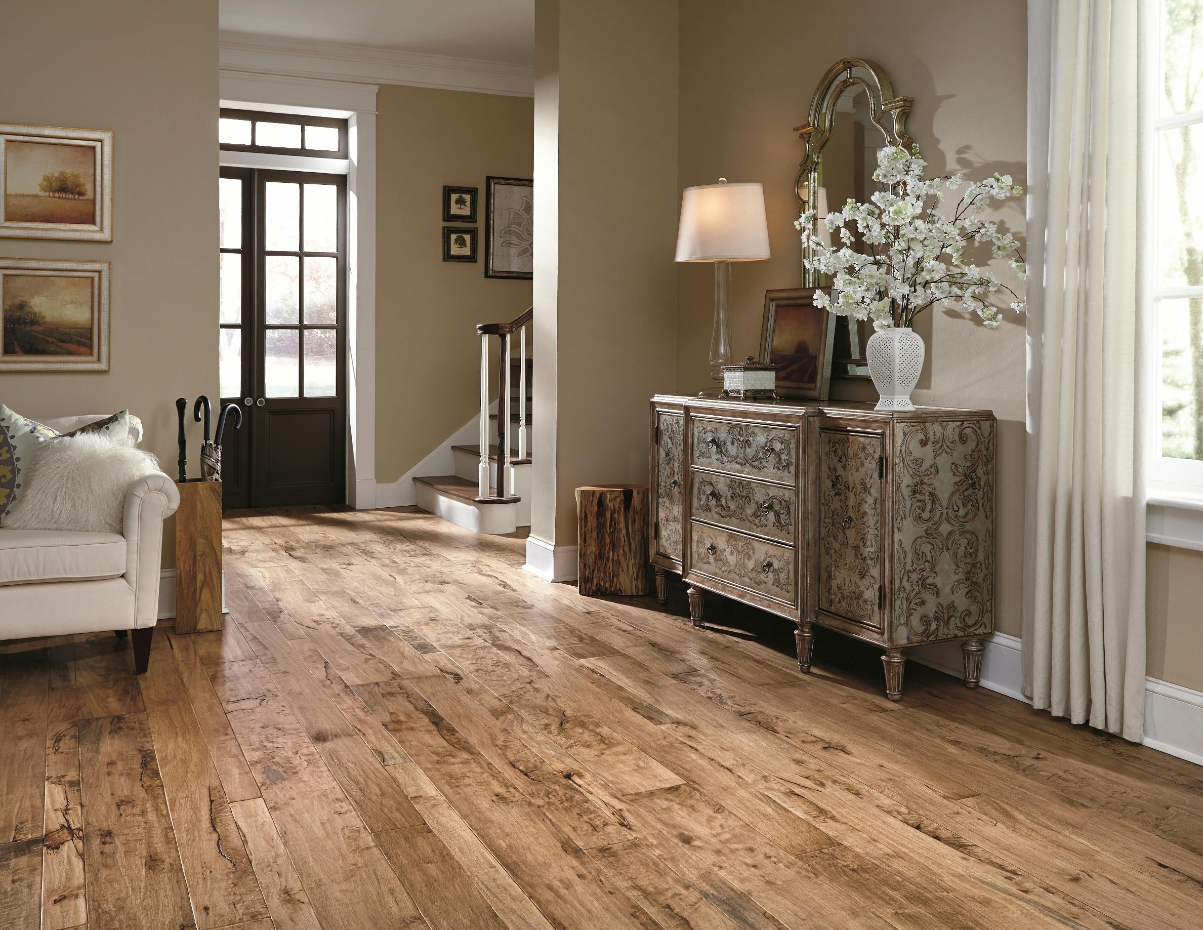 The Antigua Collection from Mannington Mills, utilizes 3-, 5-, and 7-inch random width boards and a hand scraping technique to evoke a rustic look.