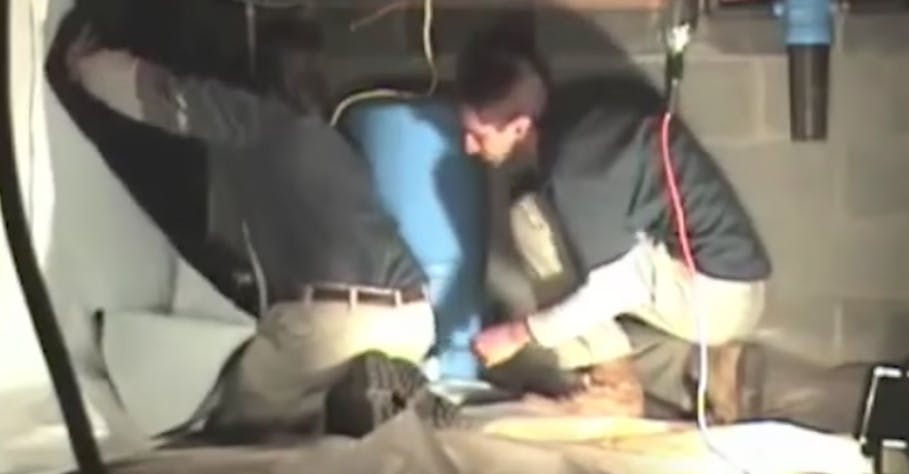 Installing a vapor barrier in a sealed crawlspace