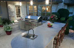 An outdoor kitchen is often planned next to or close to the kitchen of the house An outdoor kitchen is often planned next to or close to the kitchen of the house