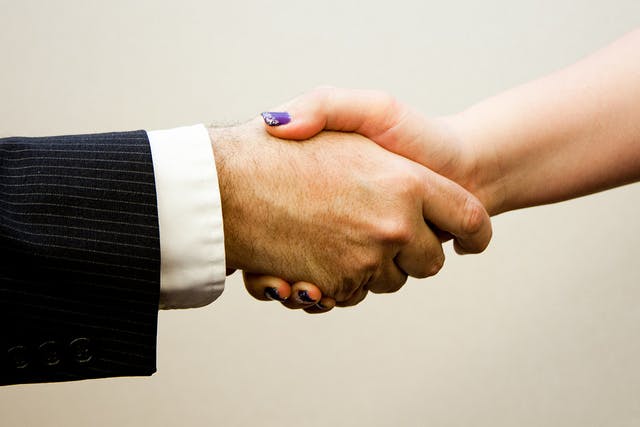 670c39b16f422a28fe5124c9 Handshakestockphoto