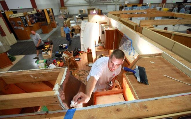 Setting up a booth for a home show