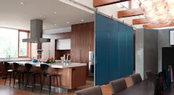 Barn doors can be used to divide large, open spaces. Farmhouse sliding door Photo: courtesy Baldur by Krown Lab Barn doors can be used to divide large, open spaces. Farmhouse sliding door Photo: courtesy Baldur by Krown Lab