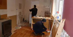 subcontractors—plumber and electrician—at work subcontractors—plumber and electrician—at work