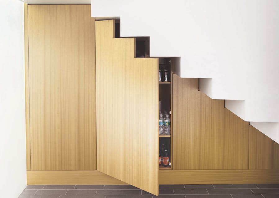 under-stair storage designed and built into the structure