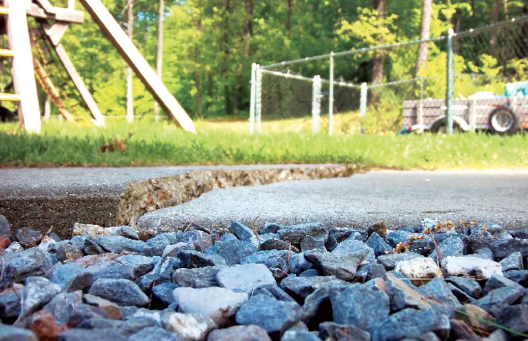 raising a concrete slab by injecting high-density foam under it