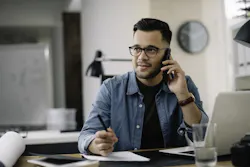 On the phone with client On the phone with client