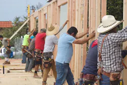 Team framing a home Team framing a home