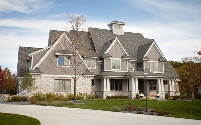 670c3b6d0a638b512d870fdf Regency20builders20traditional20custom20home20exte