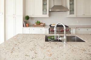 Cambria natural quartz countertop surfacing installed in a kitchen.