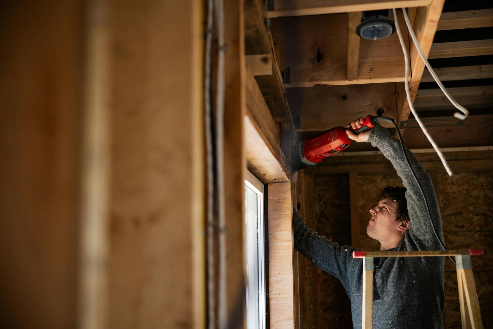Young tradesperson remodeling home: Adobe Stock