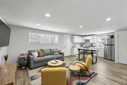 This ADU was commissioned by homeowners who wanted a separate space for in-laws and other guests to feel comfortable during longer stays. The Sasquatch team converted an old garage on the property into a modern suite, complete with large kitchenette, a spacious living area, a bed alcove, and a bathroom with an accessible walk-in shower. While this ADU isn’t intended to be a rental unit, the setup and features allow it to be used as an income-producing rental unit in the future. This ADU was commissioned by homeowners who wanted a separate space for in-laws and other guests to feel comfortable during longer stays. The Sasquatch team converted an old garage on the property into a modern suite, complete with large kitchenette, a spacious living area, a bed alcove, and a bathroom with an accessible walk-in shower. While this ADU isn’t intended to be a rental unit, the setup and features allow it to be used as an income-producing rental unit in the future.