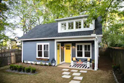 A petite private porch adds usable space to this 645-square-foot backyard cottage in Atlanta. The project was designed by ATL ADU Co. A petite private porch adds usable space to this 645-square-foot backyard cottage in Atlanta. The project was designed by ATL ADU Co.