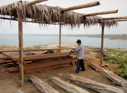 Pic 8 Sanding Lumber Under Shade Structure Pic 8 Sanding Lumber Under Shade Structure