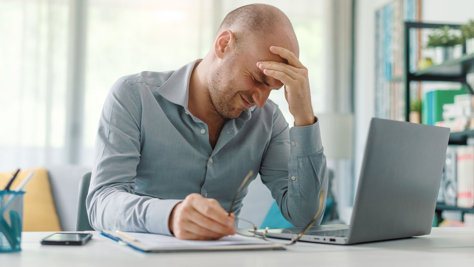 Man dealing with work-related stress.