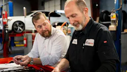 Mike Allen and a technician Mike Allen and a technician