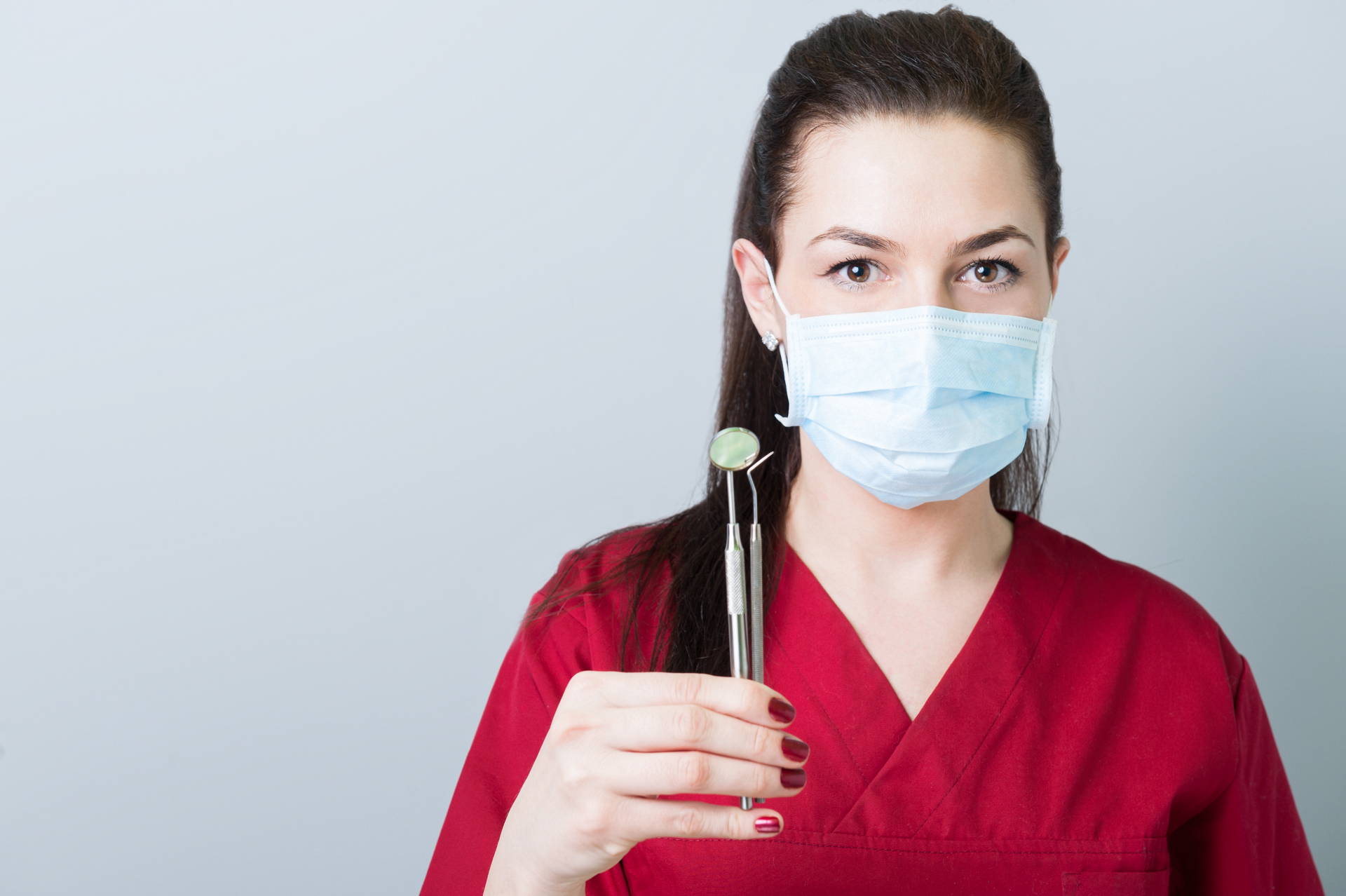 Copyright Catalin205 Dreamstime Hygienist With Dental Tools 5e5fe98458af1