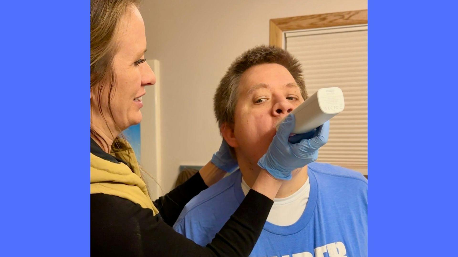 Crystal Spring introduces her brother Carter to a new toothbrush.