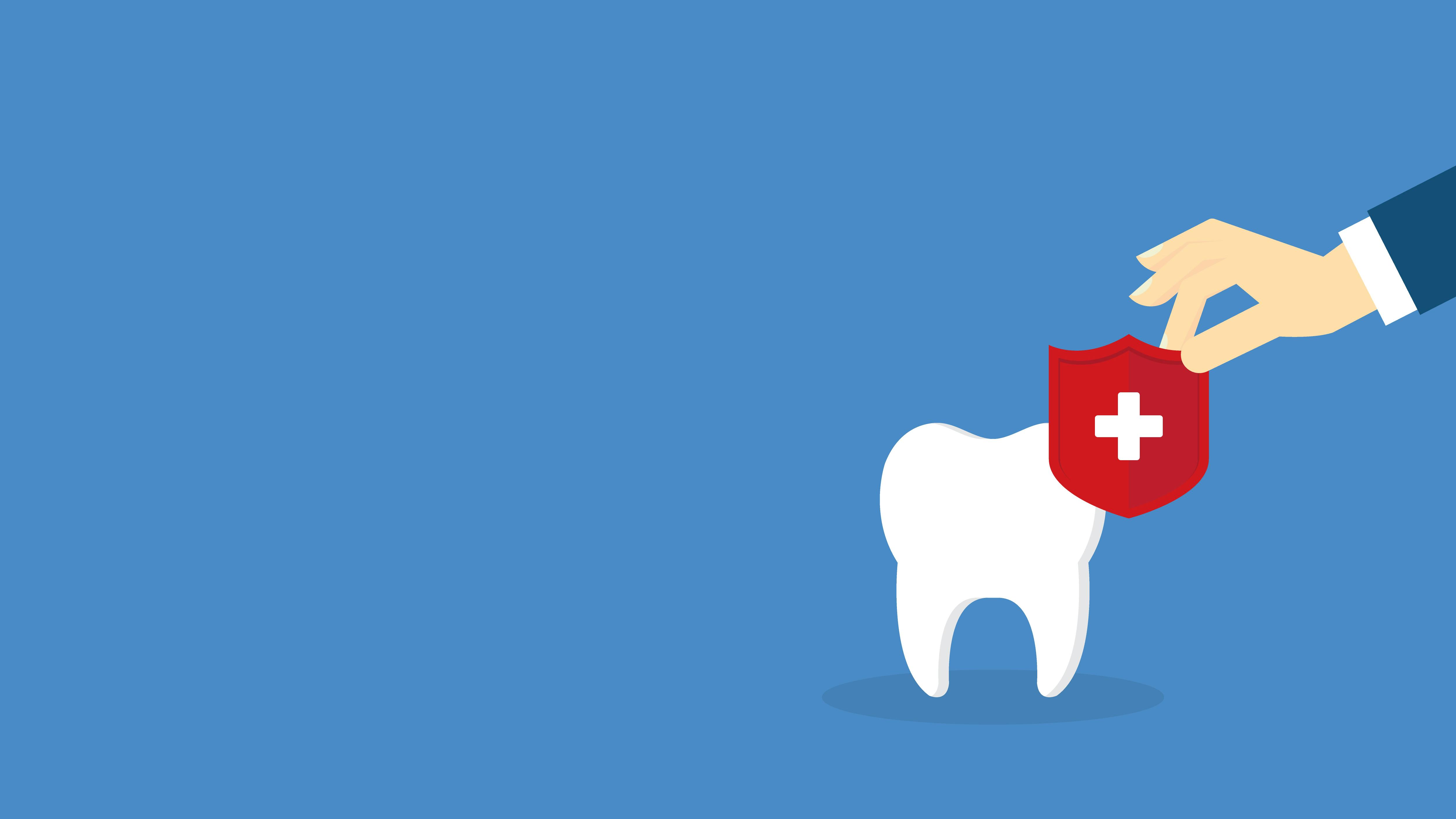 Illustration of a hand placing a red medical shield with a white cross over a tooth, symbolizing oral health protection, on a blue background.
