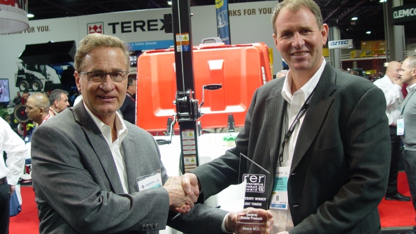 RER39s Jim Carahalios left presents Generac vice president of sales Mark Hanson with RER39s Innovative Product Award for light towers for its MLT6