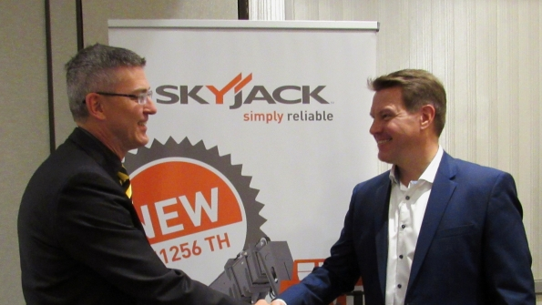 Skyjack president Brad Boehler left announces new telematics partnership with Trackunit chief operating officer Tom Valbak Aardestrup