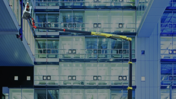 JLG39s X1000 AJ compact crawler boom at work in an office building