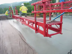 TK_Figure-2.-Wet-Burlap-placement-immediately-after-screeding TK_Figure-2.-Wet-Burlap-placement-immediately-after-screeding