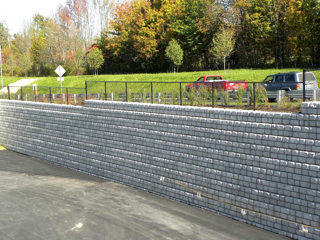 Redi-Rock-Cobblestone-Walls-for-Parking-Lot-With-Road-on-Top